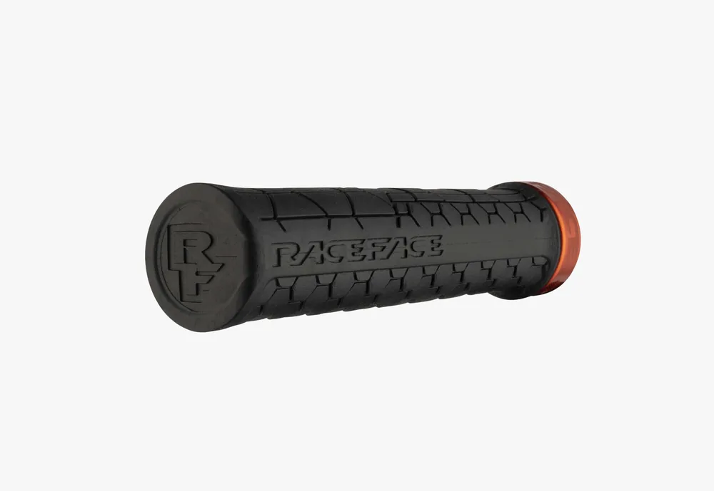 Puños RACE FACE GETTA Lock-On 135mm Negro/Naranja