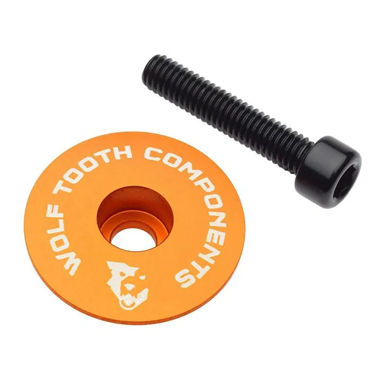 Tapa de potencia ultraligera WOLF TOOTH con tornillos naranja de 1"1/8