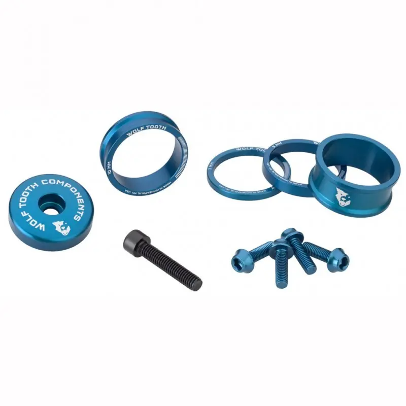 Kit Espaciador. Tapa del vástago y tornillos KIT WOLFTOOTH BLING Azul